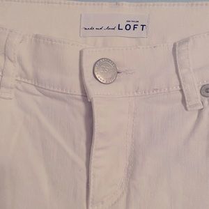 White Ann Taylor skinny jeans.